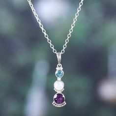 A blue topaz, a rainbow moonstone and an amethyst jewel combine their heavenly vibes in the sublime pendant dangling from Narayannii's sterling silver necklace. Directly from India, the accessory features a polished finish that enhances its unique beauty, making it the perfect complement to an elegant outfit. Pearl Anklet, India Gift, Topaz Color, Unique Beauty, Gemstone Necklace Pendant, Jewelry Packaging, A Rainbow, Elegant Outfit, Sterling Silver Necklace