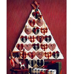 a christmas tree made out of plaid hearts