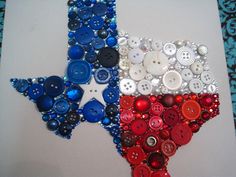 the texas flag made out of buttons is displayed on a piece of white paper with blue and red accents