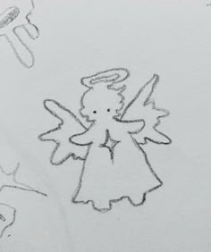 the drawing shows an angel with wings