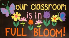 a sign that says our classroom is in full bloom