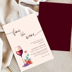 a wine themed wedding card with a glass of wine