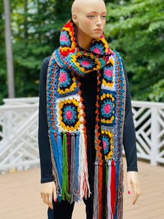 This is an over sized, super scarf made from soft acrylic yarn for HIM or HER. Unisex all year round wear. Measures over 110 long, and 8' wide. COLOR(s): Multicolored. MATERIAL: 100% Acrylic yarn CARE: Machine washable and dryable. RETURN/ REFUND POLICY: No Refunds or Returns. All items are final sale. VERY IMPORTANT: I'm NOT responsible for shipping delays once an item leaves my shop. A tracking number and phone number for the Postal Service is provided for you to track your item once shipped. Please do report damaged items within 24 hours of delivery so that I, can respond appropriately. NOTE: All items are handmade by me. If you should desire a color option not available in the shop, you can custom order one using the 'Custom Order' button on the main page, or just e-mail me. Allow 3-5 Granny Square Scarf, Super Scarf, Scarf Crochet, Over Sized, Crochet Scarves, Square Scarf, Granny Square, Acrylic Yarn, Phone Number