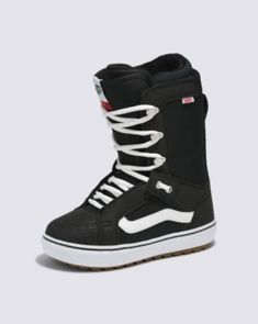 a pair of black snow boots with white laces