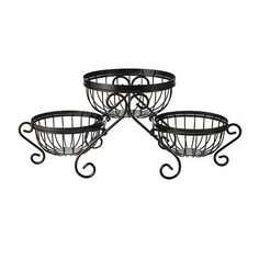 three black metal baskets sitting next to each other on top of a white background,