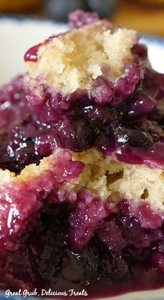 blueberry cobbler on a plate ready to be eaten