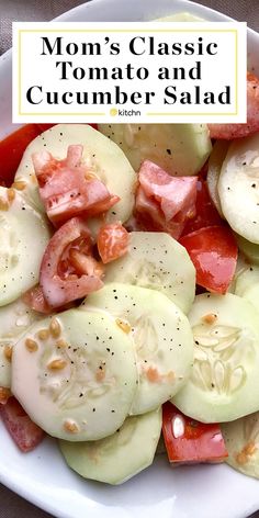 a white plate topped with cucumber salad and text that reads mom's classic tomato and cucumber salad