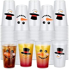 frosty cups with snowman faces on them are lined up next to each other