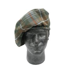 Every good Celt needs a proper, authentic, Homespun Tartan Tam. Your friends will turn green with farmad (envy) when you show up wearing your new, hand-spun matching Tam and kilt! These hats are also great on their own, to add some spice to your fall and winter outerwear. The drawstring means no worrying if the Tam will fit. Tam o' Shanter's name comes from the hero of a Robert Burns poem. It is also known as tams, Blue Bonnets, or Scot's Bonnet, found in Irish and Scottish cultures. No matter the occasion, a Tam will make an impression! -No matter the occasion, a Tam will make an impression! -It looks very authentic to what would have been woven historically. -The drawstring means no worrying if the Tam will fit. -Our Homespun Tartan is made from a 55/45 blend of polyester & wool Our Home Fall Green Cotton Hat, Casual Green Fall Hat, Fitted Green Cotton Hat, Fraser Tartan, Scottish Tam Hat, Mackay Tartan, Tam O' Shanter, Macleod Tartan, Robert Burns