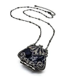 VICTORIAN Black Enamel Smoky Crystals Purse Locket Pendant 22" Chain Necklace VICTORIAN Black Enamel Smoky Crystals Purse Locket Pendant 22" Chain Necklace Click images to enlarge Description UNIQUE Black Lacquer Enamel Smoky Gray Black Crystals Purse Bag Locket Pendant 22" Antique Chain Long Necklace     Victorian Elegance!  This gorgeous unique victorian style necklace features a black lacquer enamel smoky gray & black crystals encrusted antique metal purse bag locket pendant on 22" antique me Black Enamel Party Jewelry, Antique Black Nickel-free Necklace, Victorian Black Enamel Necklace For Gift, Silver Enamel Jewelry For Evening, Black Metal Necklace With Locket, Black Metal Collectible Necklaces, Handmade Black Enamel Necklace, Gothic Locket, Victorian Elegance