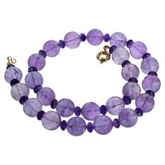 These highly polished sparkling natural real Amethyst gems are enhanced with intensely colored Amethyst gems as spacers. The large gemstones are approximately 16 mm and the beautiful spacer Amethysts are approximately 8 1/2mm. The spacer gemstones glitter naturally and intensely. The clasp is a gold plated. 1st Dibs, Amethyst Gem, Designer Jewelry, Amethyst, Jewelry Design, Gold Plate, Beaded Necklace, Jewelry Necklaces, Gems