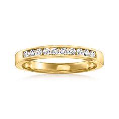 a yellow gold wedding band with five diamonds