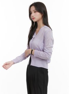 Product Detail Style : Casual, Minimal Occasion : Work wear Detail : Buttoned, See-through Print : Solid Material : Acrylic, Knit Sleeve : Long sleeve Neck : V neck Acrylic100 Color : Purple, Black, White Made in Korea Model Size Model is wearing size S/M and the color Purple. Height : 5'5" | 164cm / Top : XS / Bottom : S (25 inch) .prddescription table, .prddescription td, .prddescription th { border : 1px solid black; border-collapse : collapse; padding: 10px; } Size(Inch) Size Shoulder Bust S Bolero Sweater, The Color Purple, Clean Fashion, Chic Cardigan, Festival Trends, Tank Top Straps, Prom Outfits, Knit Sleeve, Minimal Style