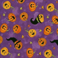 a purple background with lots of pumpkins on it