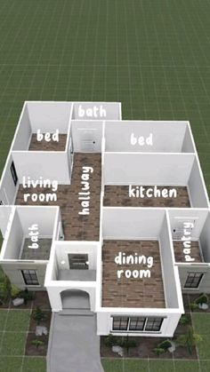 an aerial view of a three bedroom, two bath house with the kitchen and living room labeled