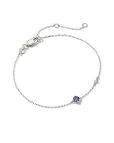 Meet this delicate and dainty layer that’s sure to delight. The Maisie Sterling Silver Delicate Chain Bracelet in Blue Iolite is our most minimal birthstone style, perfect for personalizing your look with elevated materials. Speaking of personalization, this bracelet features an adjustable closure for a custom fit. Also known as the water sapphire, Blue Iolite represents September birthdays, inspiring clarity, intuition, and self-acceptance. Metal Sterling Silver Why Sterling Silver? Our Sterlin Kendra Scott Bracelet, Sapphire Bracelet, Delicate Chain, Demi Fine Jewelry, Sterling Silver Necklace Pendants, Sapphire Blue, Silver Pendant Necklace, Kendra Scott, Pure Silver