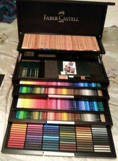 the faber castel box is full of different colored pencils