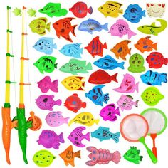 an assortment of plastic fish and fishing toys