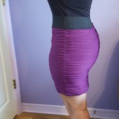 Purple And Black Stretch Midi Skirt. Gorgeous For Any Occasion - Casual Or Business. Size L Purple Stretch High Waist Skirt, Purple Stretch Mini Skirt, Purple High Waist Stretch Skirt, High Waist Purple Lined Skirt, High Waist Stretch Purple Skirt, Fitted Purple Mini Skirt For Party, Purple Stretch Mini Length Bottoms, Stretch Purple Mini Length Bottoms, Purple Fitted High Waist Mini Skirt