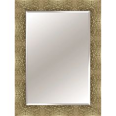 a mirror that is on top of a white wall with a gold border around it