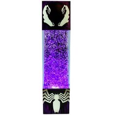 a skateboard with purple and black designs on it