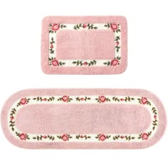 two pink rugs with roses on them and one has a border in the middle