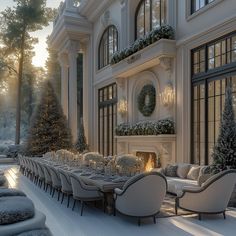 a large dining room set up in front of a fireplace with christmas decorations on it