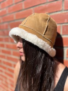 Sheepskin Cozy Winter Accessory hat, Stylish & Warm hat, Soft and Trendy hat, Perfect for Cold Weather hat, Fashionable and Functional hat Medical Sheepskin, Regulan Sheepskin, Extra Soft Sheepskin Rug, Golden Nursery Sheepskin, Natural Sheepskin Rug, Genuine Sheepskin Rug Introducing the Santa Fe Sheepskin Bucket Hat, a retro but classic design fused with warmth and versatility. Crafted with a premium sheepskin leather outer shell, with the inner shell and lining & made of 100% natural shearlin Cold Weather Hats, Trendy Hat, Sheepskin Rug, Chilly Weather, Cozy Fits, Cozy Winter, Winter Accessories, Custom Boxes, Retro Design