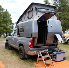 the back end of a truck with an awning on it