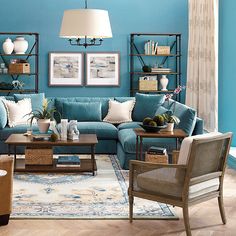 a living room with blue walls and furniture