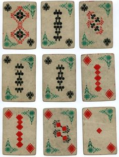 six playing cards with different designs on them, all in red and green colors are shown