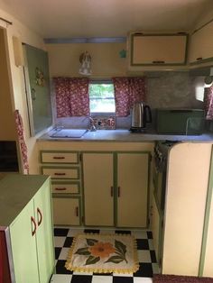 the kitchen is clean and ready to be used as a family room or playroom