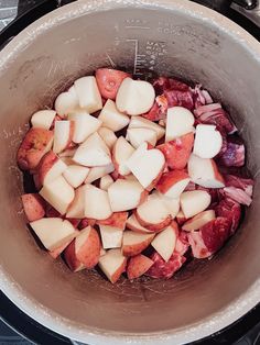 chopped potatoes and meat in a pot on the stove