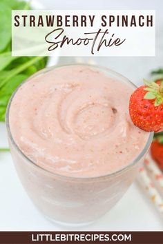 strawberry spinach smoothie in a glass with strawberries on the side and text overlay