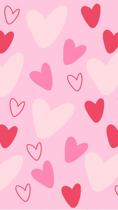 many hearts are arranged on a pink background