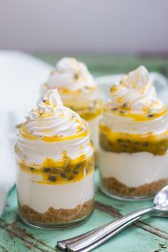 three small desserts are sitting on a table