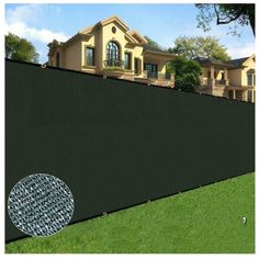 a black privacy fence in front of a house with the number 6'x 50 '