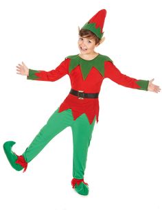 a young boy dressed in an elf costume with his arms out and legs spread wide