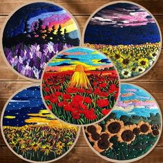 four round pictures with flowers in them on a wooden surface, one is painted and the other has an image of sunflowers