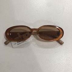 Le Specs Light Brown Small Oval Sunglasses. Condition is New with tags. Shipped with USPS Ground Advantage. Gen Z Sunglasses, Early 2000s Sunglasses, Aesthetic Sunglasses Vintage, Vintage Designer Sunglasses, Fun Glasses Frames, Thrifted Sunglasses, 90s Sunglasses Vintage, Small Oval Glasses, 2000s Glasses