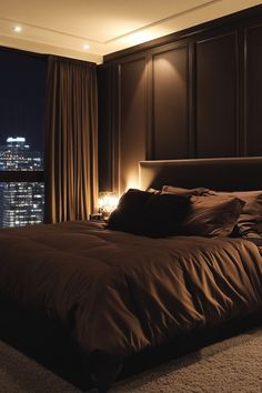 a bedroom with a large bed and night lights