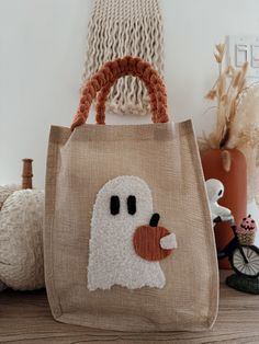 a bag with a white ghost on it