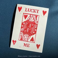 a playing card that says lucky me with hearts on the bottom and an image of a woman holding a baby in her arms