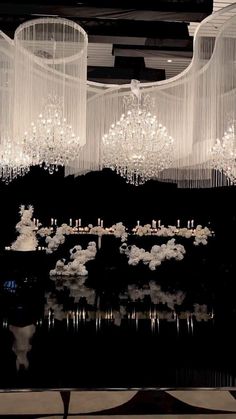 chandeliers hanging from the ceiling in a room