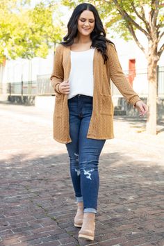 You'll leave a lasting impression on the crowd in this beautiful cardigan! The soft brown color and ribbed texture is SO cute and trendy! The stretchy material is so comfy and is perfect for every day wear! Style this cardigan with a solid top and skinnies or a cute dress and booties for a casual, chic look!  97% Polyester, 3% Spandex Brown Cardigan Outfit, Soft Brown Color, What To Wear Fall, Cute Thanksgiving Outfits, Cardigan Brown, Curvy Women Jeans, Cardigan Outfits, Soft Brown, Thanksgiving Outfit