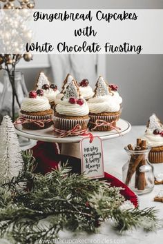 christmas cupcakes with white chocolate frosting on a platter