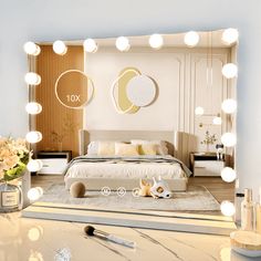 there is a mirror that has lights on the wall above it and an image of a bed