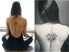 the back of a woman's body with a lotus tattoo on it