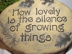 a stone that says how lovely is the silence of growing things