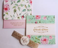 three wedding cards with flowers on them, one is pink and the other is green